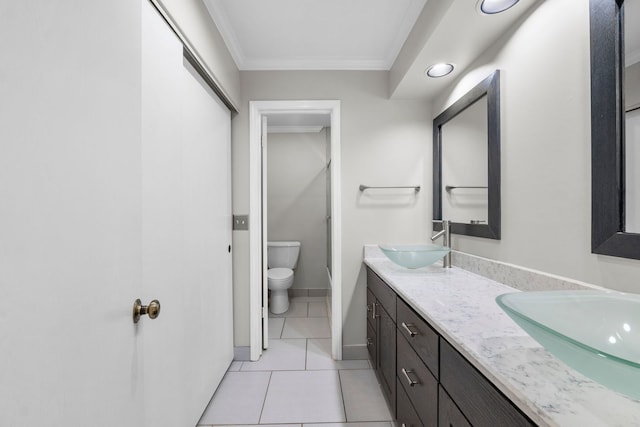 3130 Kayjay Dr, Northbrook, IL 60062 - full bathroom with double vanity, toilet, a sink, crown molding, and tile patterned flooring