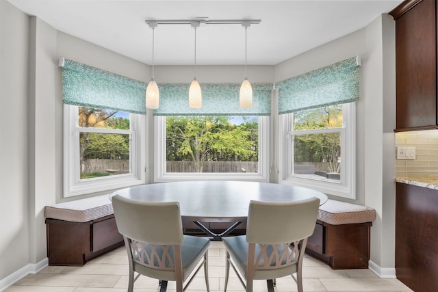 3130 Kayjay Dr, Northbrook, IL 60062 - dining area with baseboards, breakfast area, and light tile patterned floors