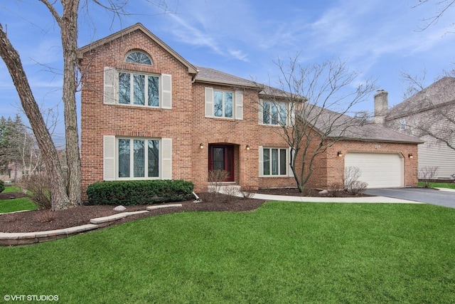 354 Gateshead Dr, Naperville, IL 60565 - view of front facade with brick siding, a front yard, and aphalt driveway