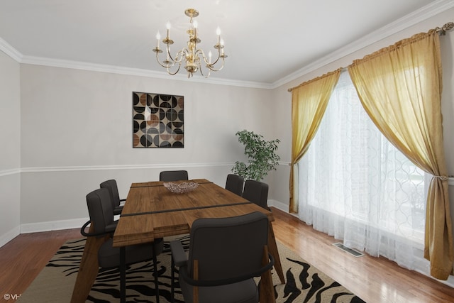 354 Gateshead Dr, Naperville, IL 60565 - dining area with baseboards, a notable chandelier, ornamental molding, and visible vents
