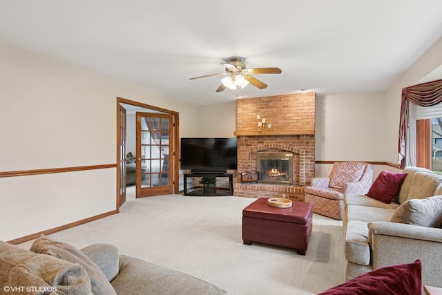 354 Gateshead Dr, Naperville, IL 60565 - living room featuring a brick fireplace, a ceiling fan, baseboards, and carpet