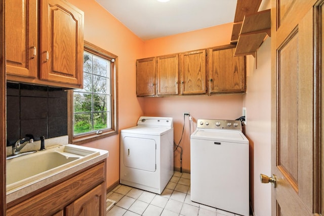 3664 E 2619th Rd, Sheridan, IL 60551 - clothes washing area with cabinet space, washing machine and clothes dryer, and light tile patterned floors