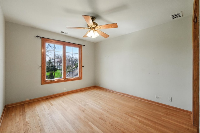 3664 E 2619th Rd, Sheridan, IL 60551 - spare room featuring light wood finished floors, ceiling fan, and baseboards