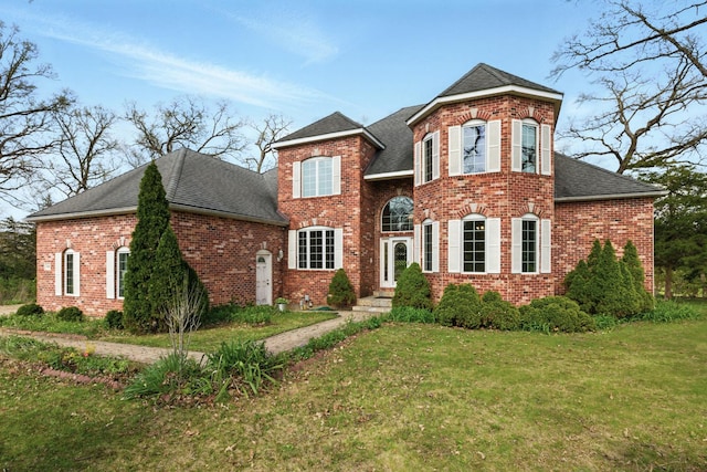 3664 E 2619th Rd, Sheridan, IL 60551 - view of front of home with roof with shingles, a front yard, and brick siding