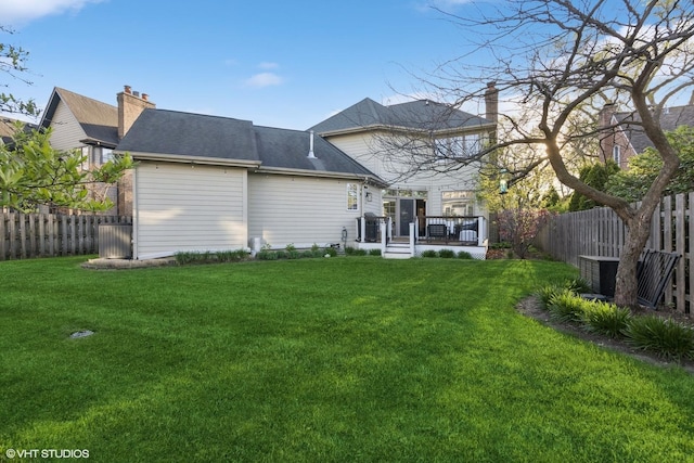 117 Iroquois Dr, Clarendon Hills, IL 60514 - back of house featuring a wooden deck and a chimney
