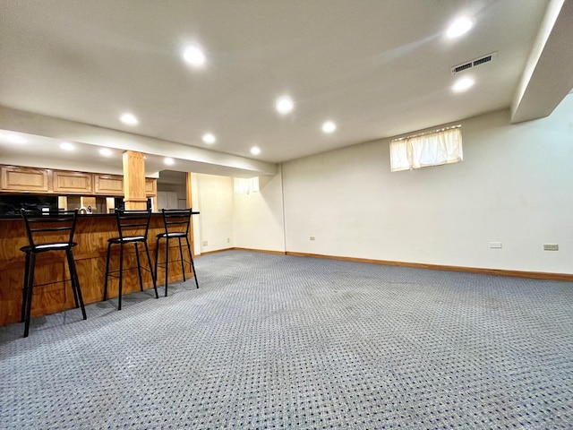 interior space with light colored carpet, baseboards, visible vents, and recessed lighting