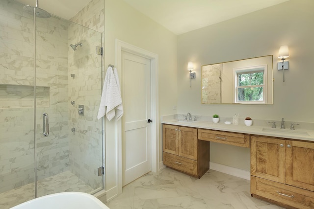 full bathroom featuring a sink, a shower stall, and marble finish floor