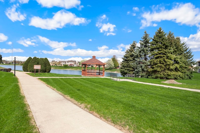 view of home's community with a gazebo and a lawn