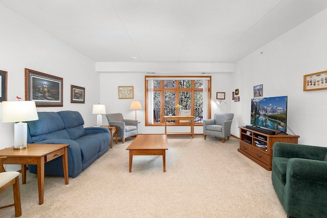 living room featuring light colored carpet