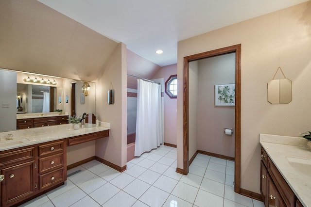bathroom with vanity, baseboards, curtained shower, lofted ceiling, and visible vents