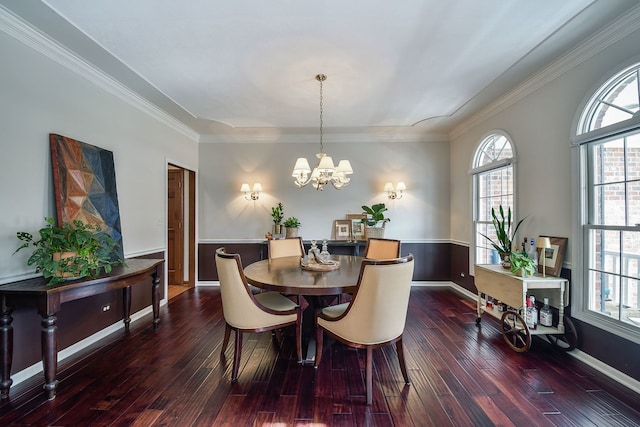dining room featuring an inviting chandelier, plenty of natural light, dark wood-style floors, and crown molding