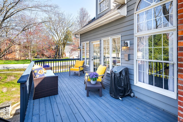 wooden terrace with grilling area