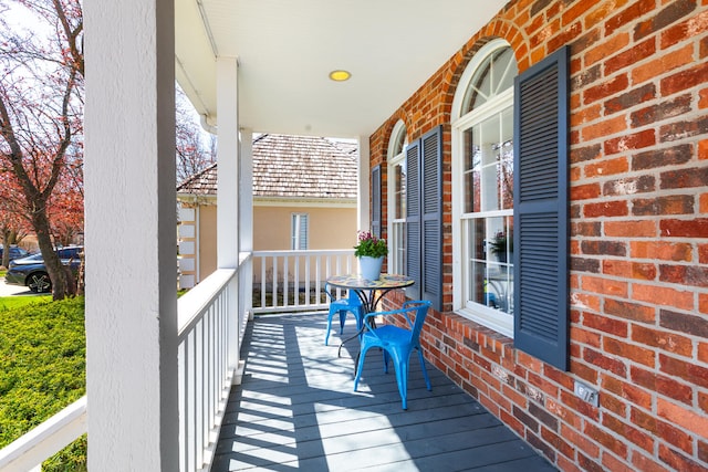 wooden terrace with covered porch