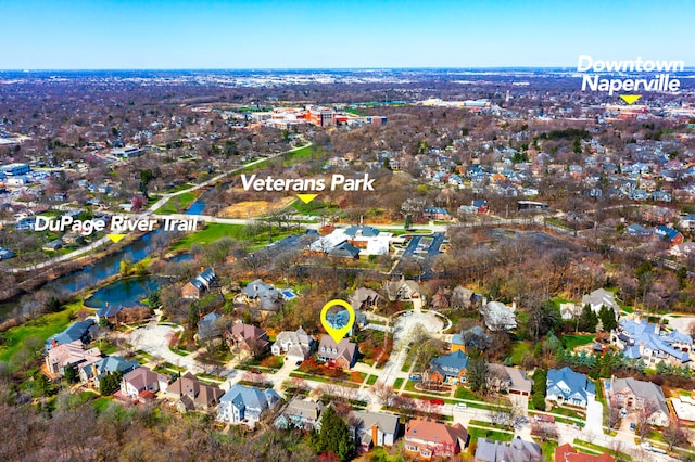 birds eye view of property featuring a residential view and a water view