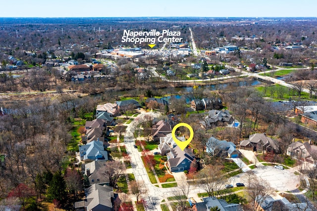 bird's eye view with a residential view and a water view