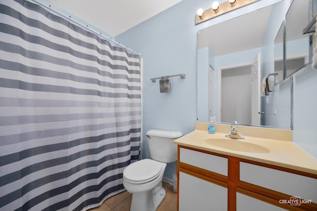 1025 Chaucer Ct E Unit B, Elgin, IL 60120 - full bathroom with toilet, tile patterned floors, and vanity