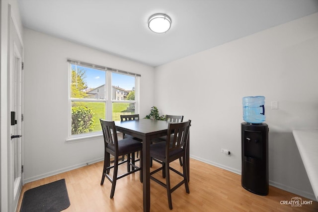 1025 Chaucer Ct E Unit B, Elgin, IL 60120 - dining area featuring light wood finished floors and baseboards