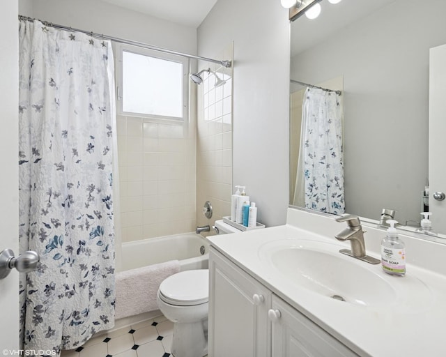 full bathroom with vanity, toilet, and shower / tub combo