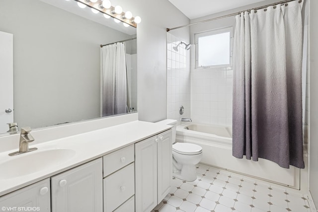 bathroom featuring tile patterned floors, shower / bathtub combination with curtain, vanity, and toilet