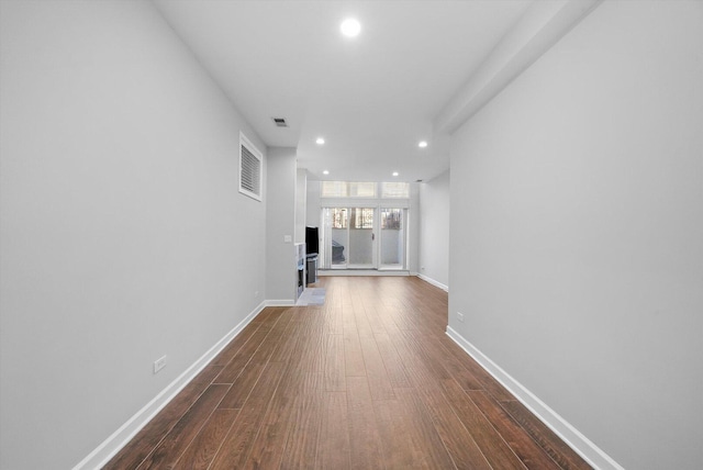 2515 W Harrison St Unit 1, Chicago, IL 60612 - hallway featuring recessed lighting, dark wood finished floors, baseboards, and visible vents