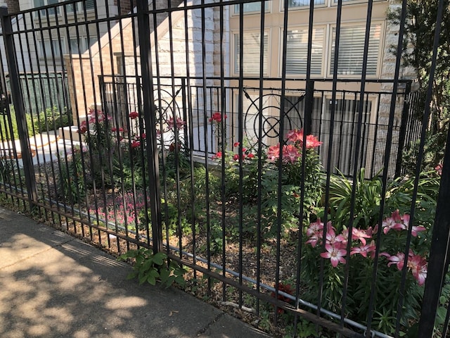 2515 W Harrison St Unit 1, Chicago, IL 60612 - view of gate featuring fence