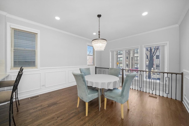 2515 W Harrison St Unit 1, Chicago, IL 60612 - dining area with a chandelier, wood finished floors, and visible vents