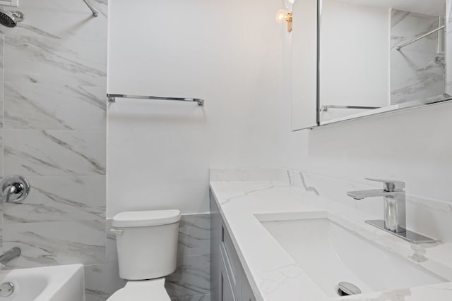 full bath with vanity, shower / bathing tub combination, and toilet