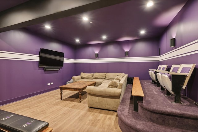 home theater room with recessed lighting and wood finished floors