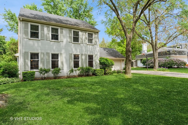 6S475 Sussex Rd, Naperville, IL 60540 - colonial home featuring driveway, a front yard, and a garage