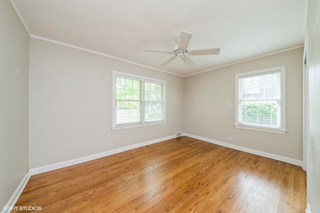1008 N Vail Ave, Arlington Heights, IL 60004 - unfurnished room with crown molding, wood finished floors, baseboards, and ceiling fan