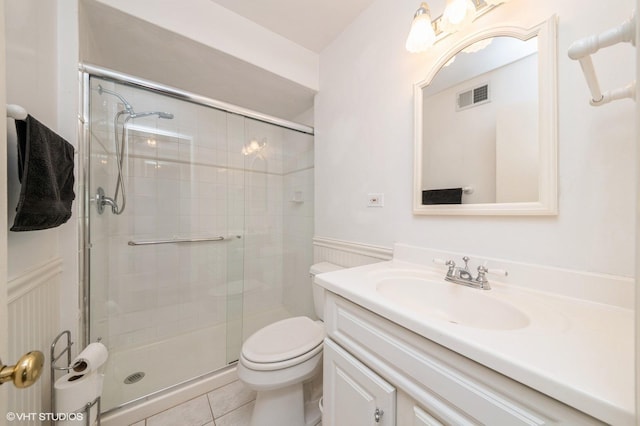1008 N Vail Ave, Arlington Heights, IL 60004 - full bath featuring vanity, toilet, a stall shower, wainscoting, and tile patterned floors
