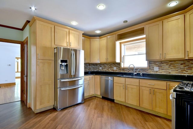 7840 W Cressett Dr, Elmwood Park, IL 60707 - kitchen featuring appliances with stainless steel finishes, light brown cabinets, a sink, recessed lighting, and ornamental molding