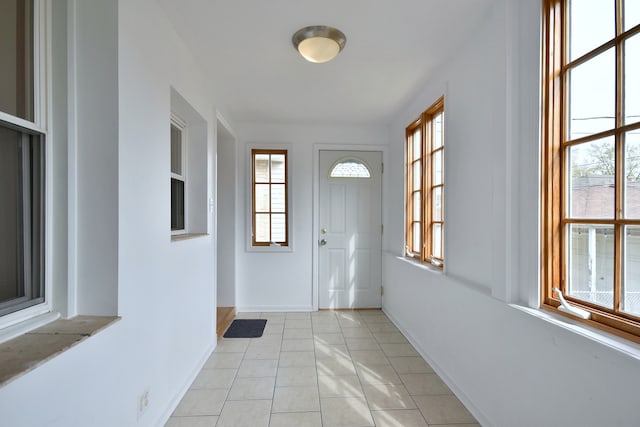 7840 W Cressett Dr, Elmwood Park, IL 60707 - entrance foyer featuring light tile patterned flooring and baseboards