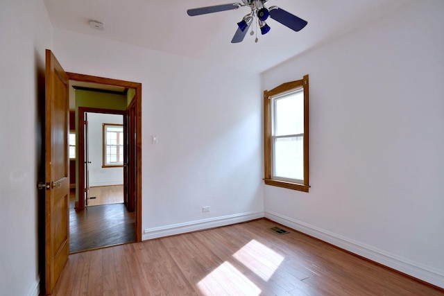 7840 W Cressett Dr, Elmwood Park, IL 60707 - unfurnished room with light wood-type flooring, a smoke detector, baseboards, and ceiling fan