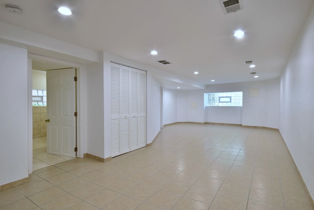7840 W Cressett Dr, Elmwood Park, IL 60707 - empty room featuring a smoke detector, light tile patterned floors, recessed lighting, and baseboards