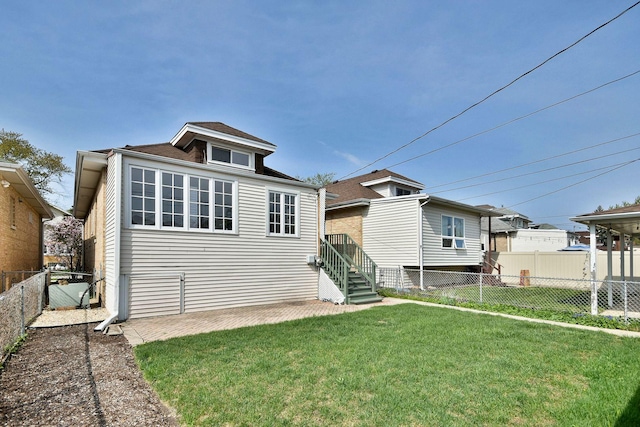 7840 W Cressett Dr, Elmwood Park, IL 60707 - back of property featuring a patio area