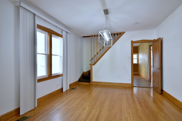 7840 W Cressett Dr, Elmwood Park, IL 60707 - spare room with wood-type flooring, stairs, baseboards, and a smoke detector