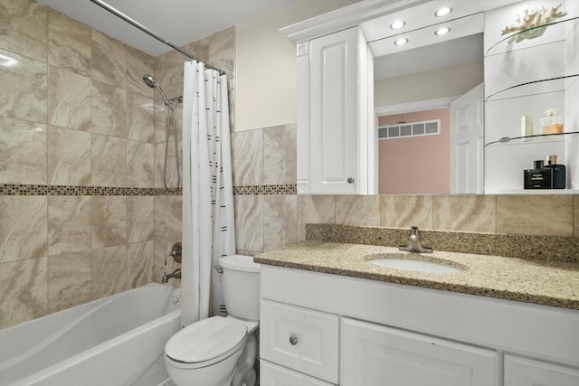 387 Coventrey Ct Unit 0, Clarendon Hills, IL 60514 - full bath with tile walls, shower / bath combination with curtain, vanity, and toilet