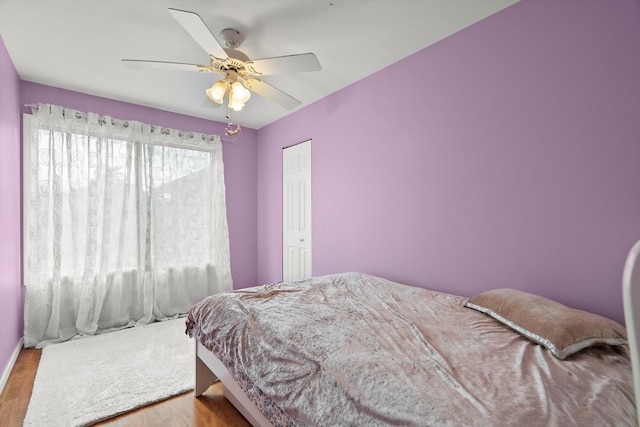 387 Coventrey Ct Unit 0, Clarendon Hills, IL 60514 - bedroom featuring wood finished floors, ceiling fan, and a closet