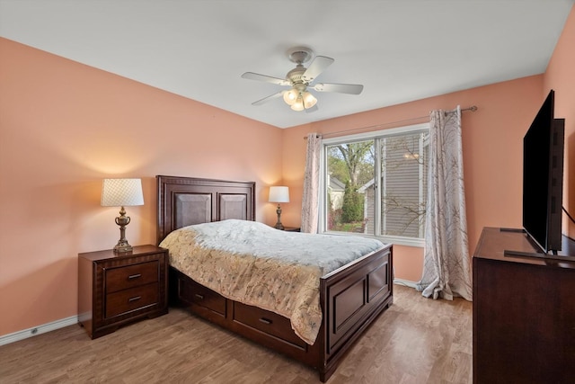 387 Coventrey Ct Unit 0, Clarendon Hills, IL 60514 - bedroom with baseboards, light wood-style flooring, and a ceiling fan