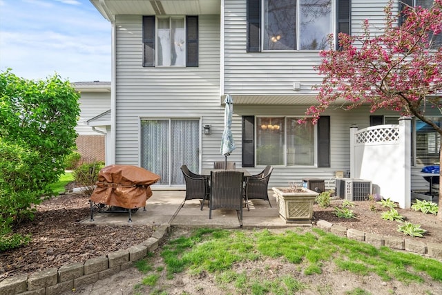 387 Coventrey Ct Unit 0, Clarendon Hills, IL 60514 - back of house with a patio, central air condition unit, and a fire pit