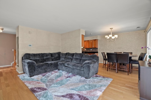 387 Coventrey Ct Unit 0, Clarendon Hills, IL 60514 - living area with a chandelier and light wood-style floors