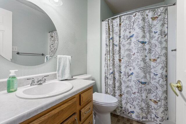 611 Northgate Dr, Saint Joseph, IL 61873 - bathroom featuring toilet, vanity, and a shower with curtain