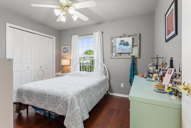 611 Northgate Dr, Saint Joseph, IL 61873 - bedroom featuring dark wood finished floors, baseboards, a closet, and ceiling fan