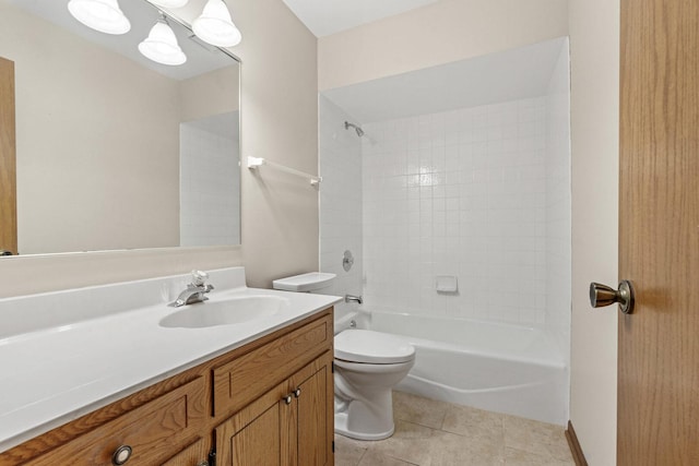bathroom featuring vanity, tile patterned floors, bathing tub / shower combination, and toilet