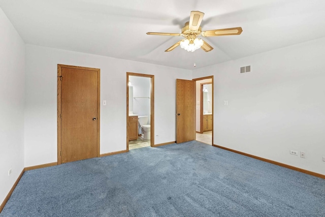 unfurnished bedroom with ceiling fan, visible vents, baseboards, connected bathroom, and light carpet