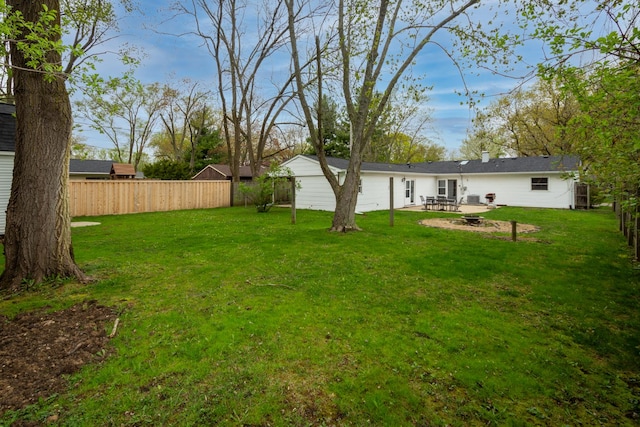 view of yard featuring a patio area and a fire pit