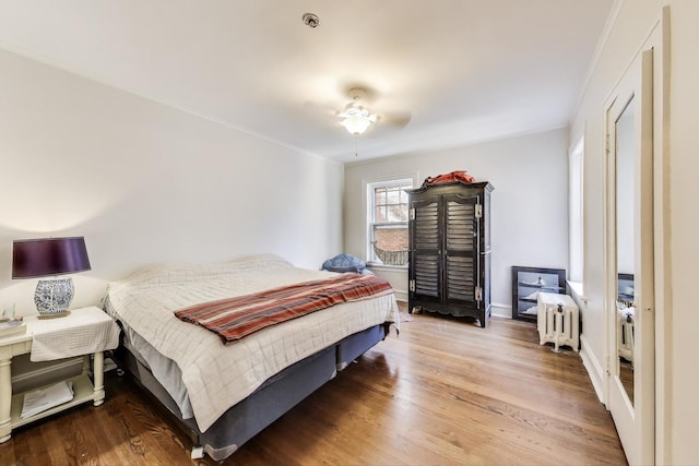 918 Michigan Ave Unit 3, Evanston, IL 60202 - bedroom with wood finished floors and radiator