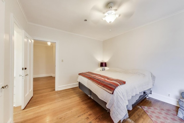 918 Michigan Ave Unit 3, Evanston, IL 60202 - bedroom with light wood-style flooring and crown molding