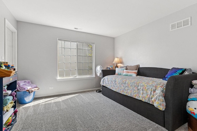 1000 Salvia Ln, Joliet, IL 60431 - bedroom with baseboards, visible vents, and carpet